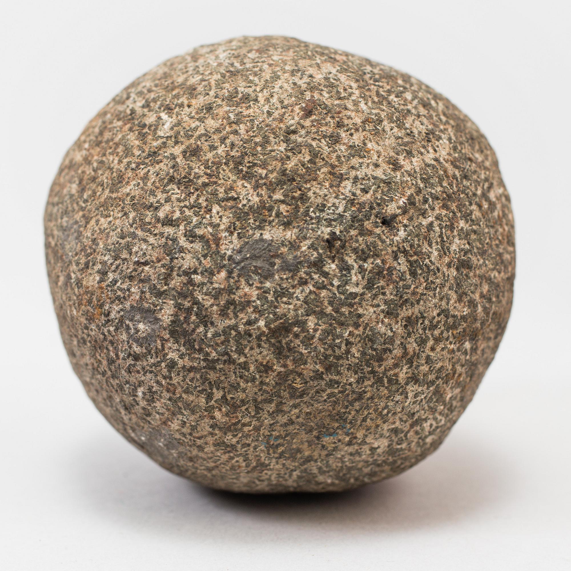 A set of five iron and stone balls.