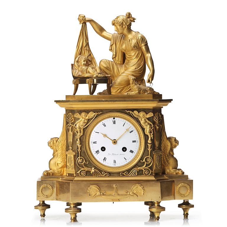 A Empire early 19th century gilt bronze mantel clock.