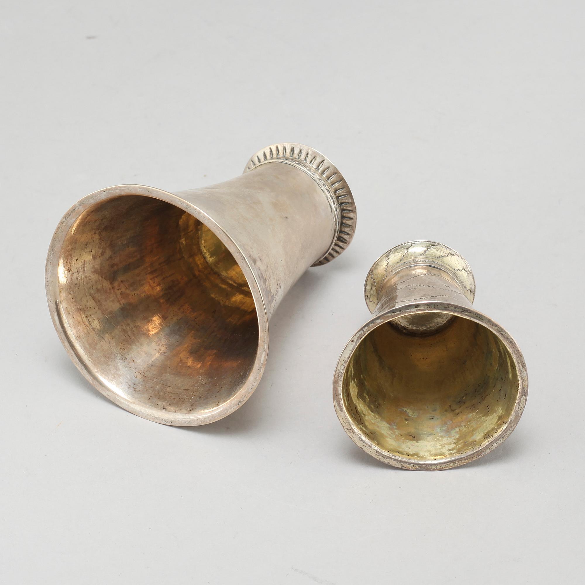 Two silver beakers by  Petter Sundelius, Visby (1785-1813) and Conrad Heitmüller, Nyköping, (1735-1779).