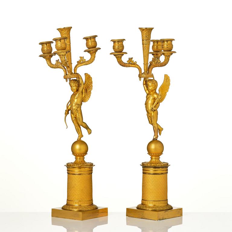 A pair of Empire ormula candelabras.