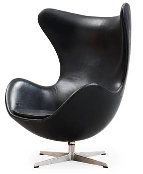 An Arne Jacobsen black leather 'Egg' chair, Fritz Hansen, Denmark 1966.