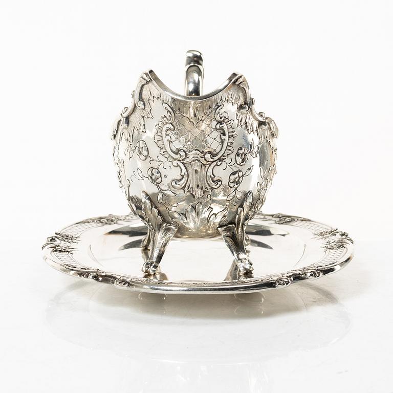 J.H Werner, sauce boat on tray, silver, Rococo style, Germany early 20th century.
