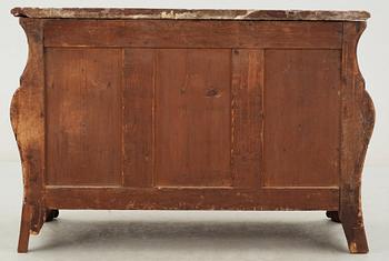A French Régence 18th century commode in the manner of F. Mondon.