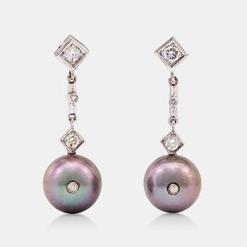 1329. A pair of cultured Tahiti pearl and diamond earrings.
