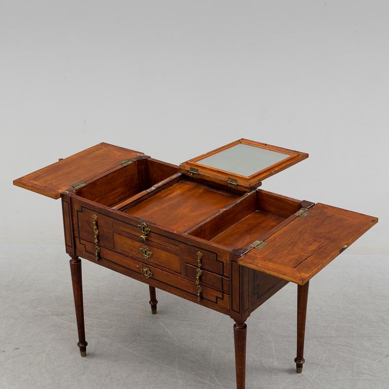 An end of the 18th century dressing  table with drawers and mirror.