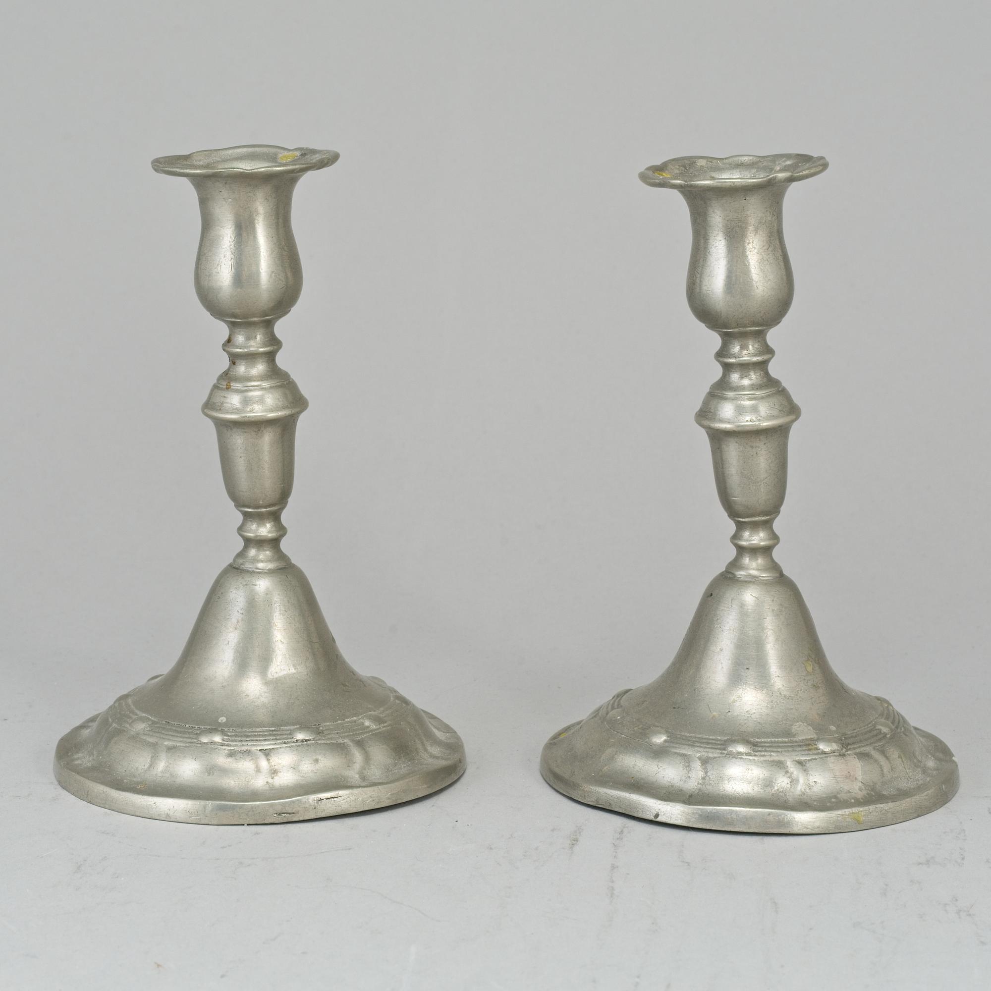 A pair of pewter candlesticks, Lars Claesson Fries, Strängnäs (1760-90).