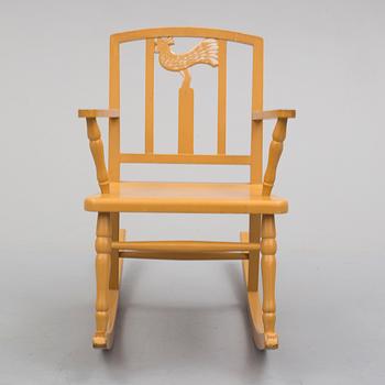 Carl Hörvik, A Carl Hörvik children's rocking chair, Nordiska Kompaniet, the model exhibited in Gothenburg 1923.