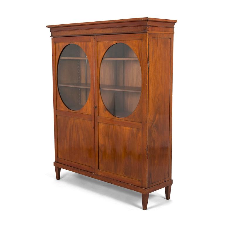 An Empire cabinet, circa 1810.