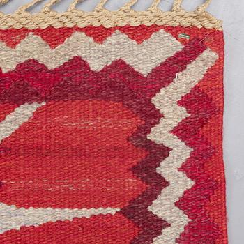 Barbro Nilsson, A CARPET, "Strålblomman, röd", flat weave, ca 313,5 x 200-202,5 cm, signed AB MMF BN.