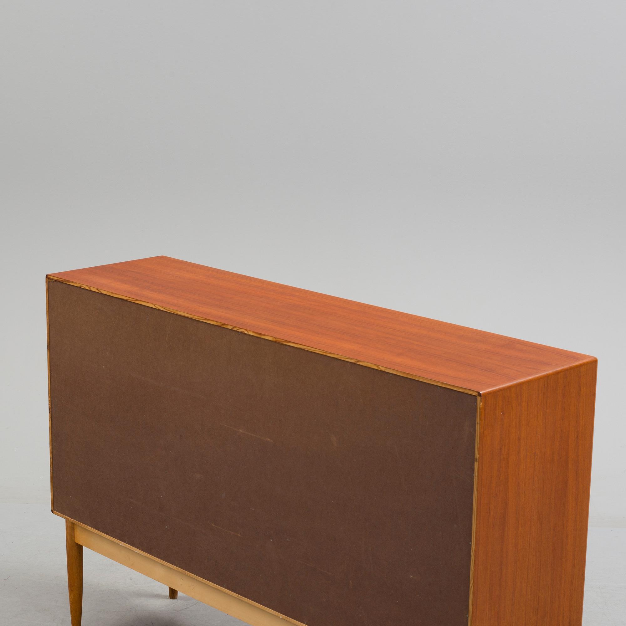 A second half of the 20th century teak veneered sideboard by Bertil Fridhagen, Bodafors, Sweden.