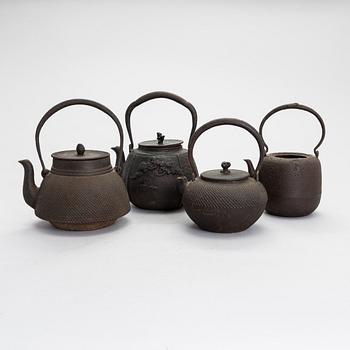 Four Japanese teapots.