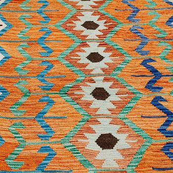 A KILIM RUG, 300 x 254 cm.