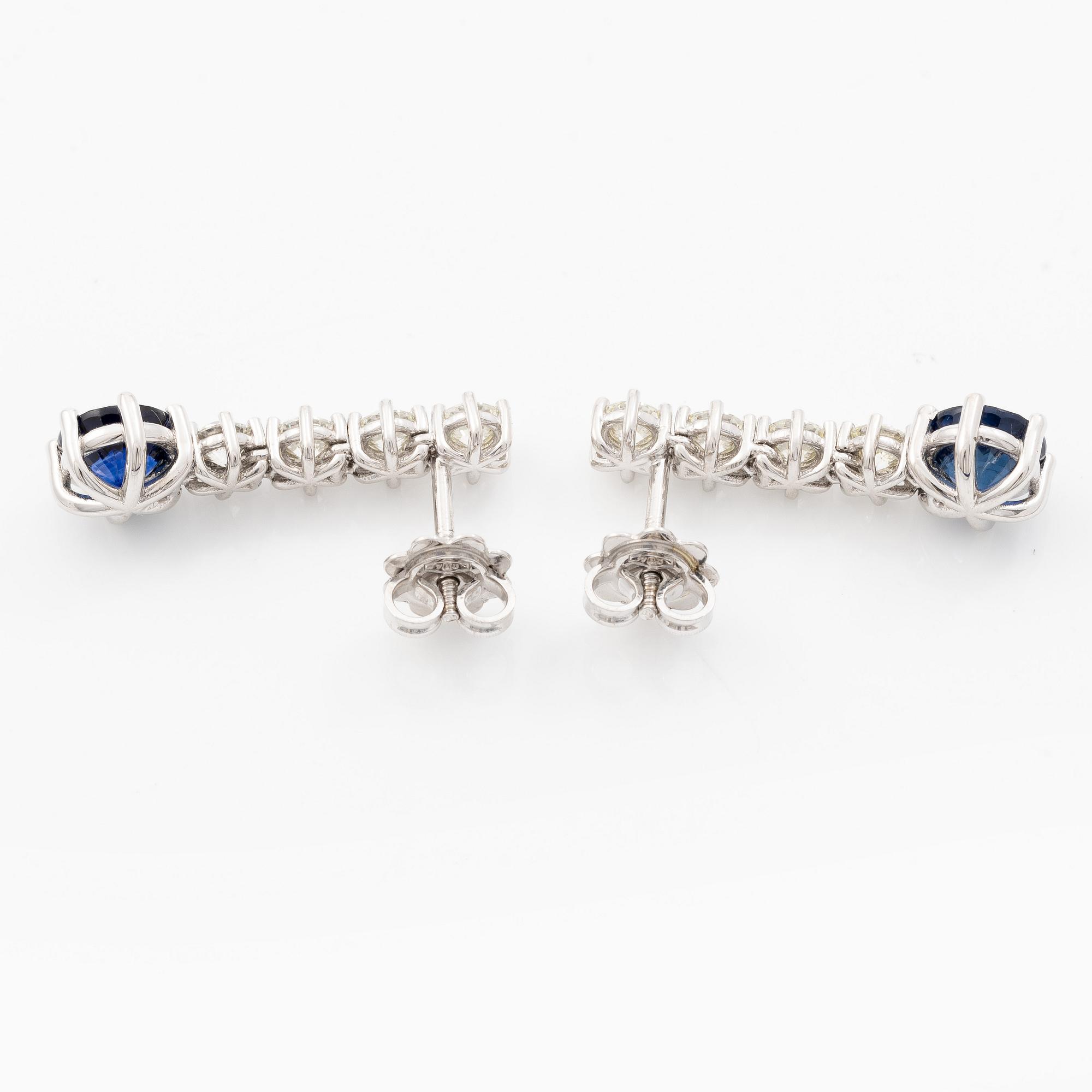 Earrings 18K white gold with sapphires and brilliant-cut diamonds.