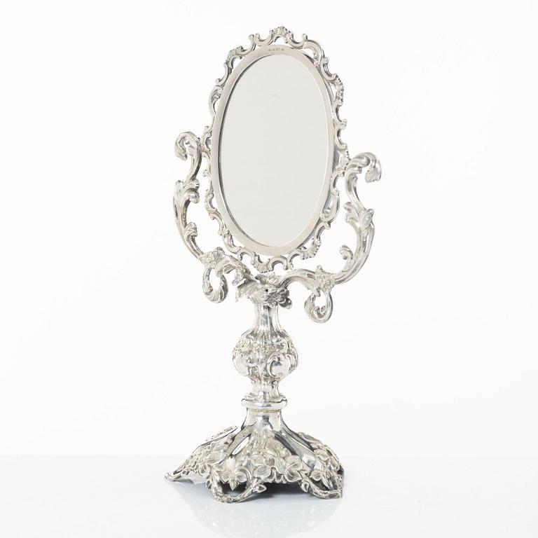 A Swedish silver dressing table mirror on stand, mark of Gustaf Möllenborg, Stockholm 1856.