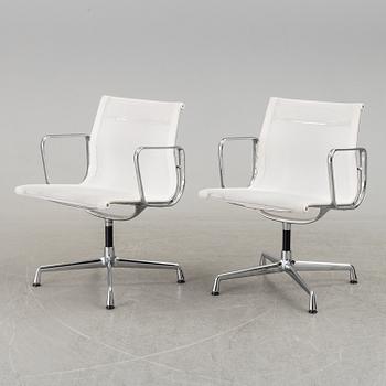 A pair of 'EA 108' desk chairs by Charles & Ray Eames for Vitra.