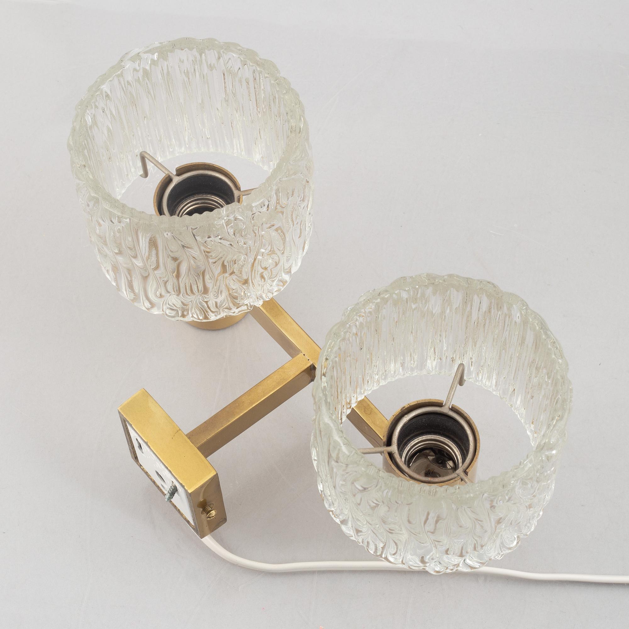 A pair of wall lamps, second half of the 20th Century.