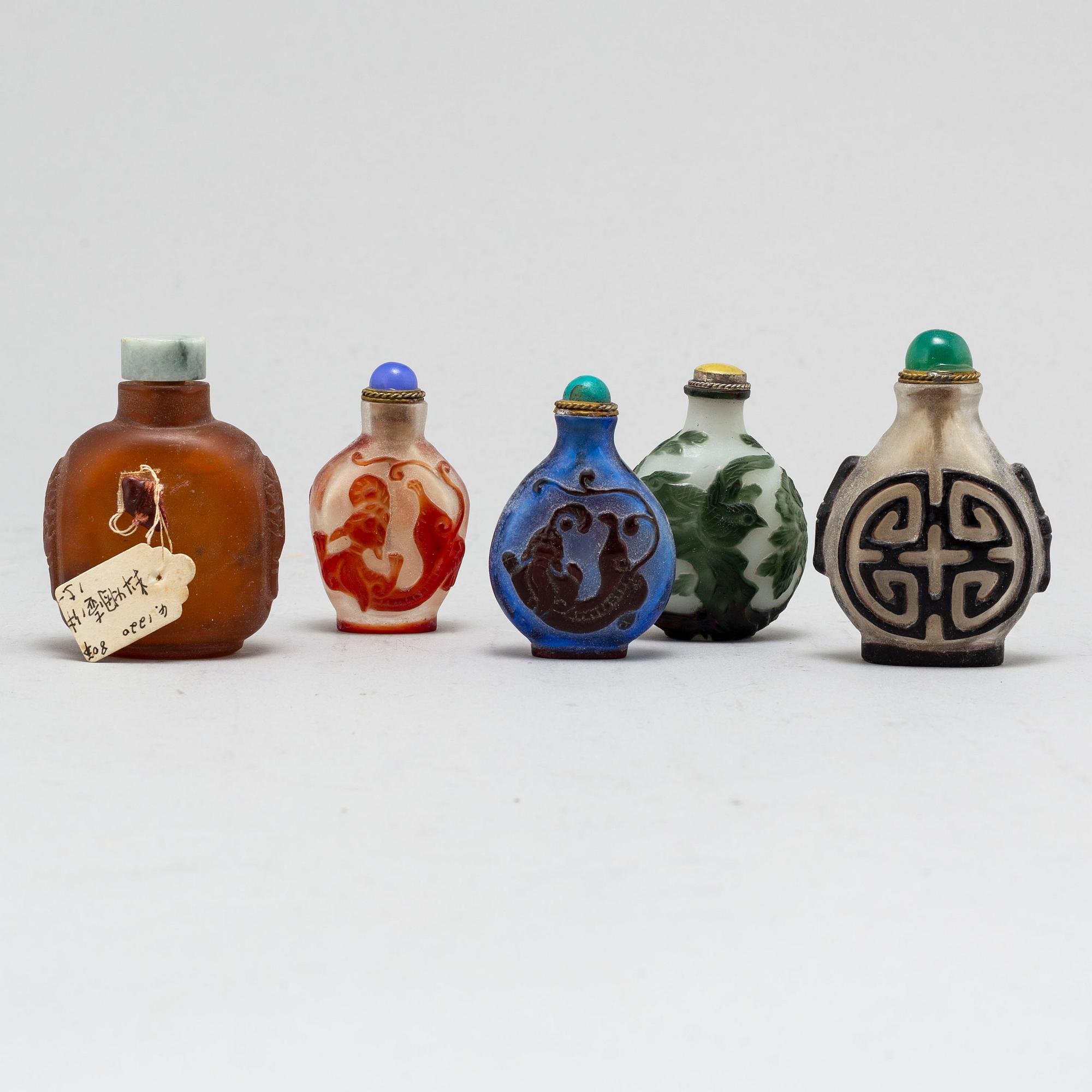 Five Chinese glass snuff bottles, 20th century.