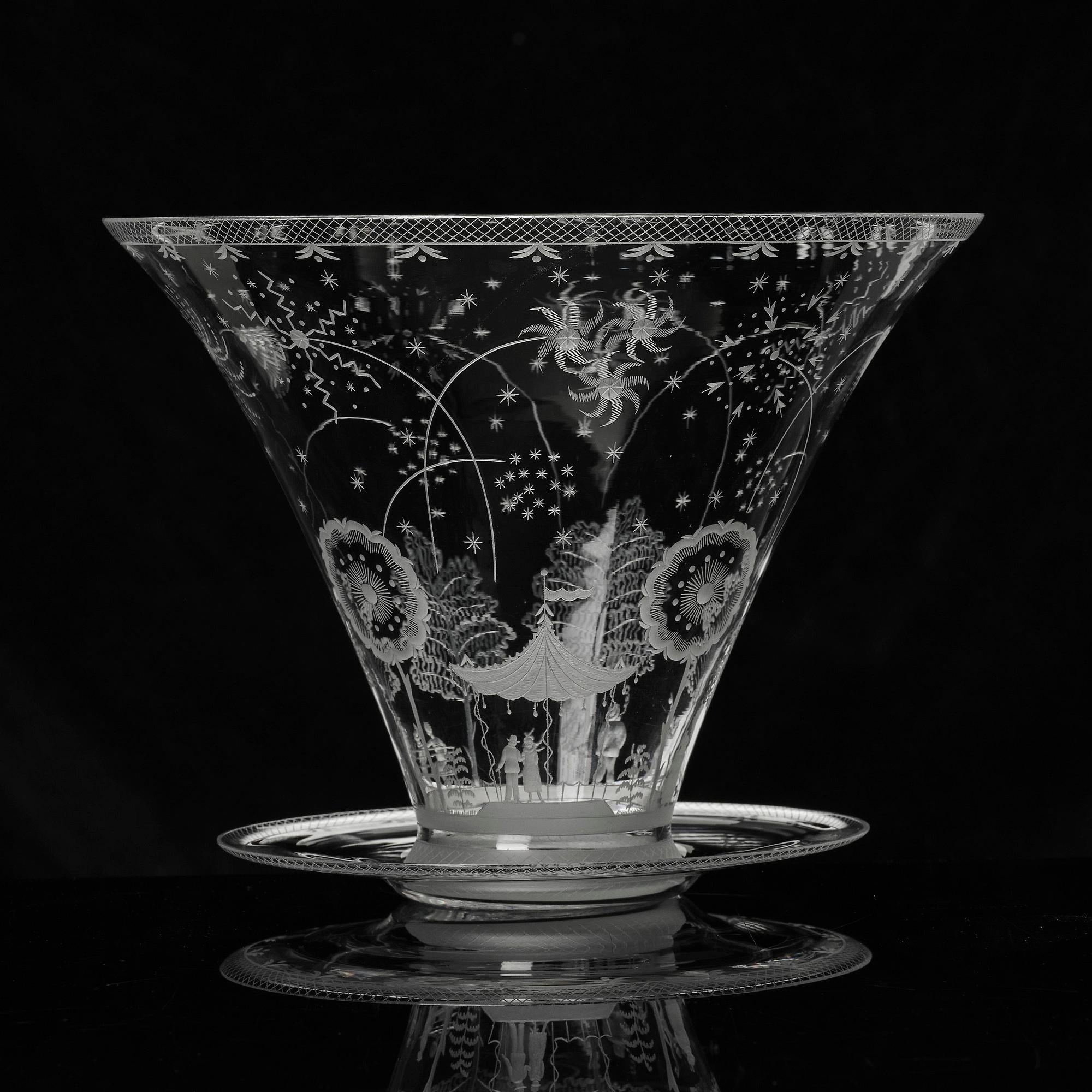 Edward Hald, a Swedish Grace "Fyrverkeri" (Fireworks) engraved glass bowl with a plate, Orrefors, Sweden, 1925, model 248.