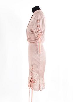 A dress and bolero by John Galliano.