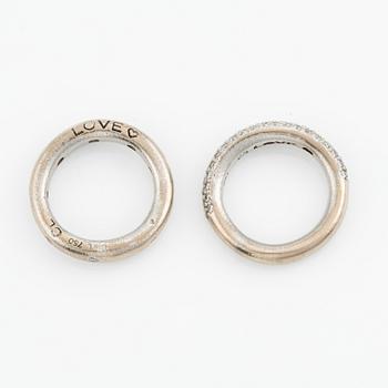 Ole Lynggaard two "Love" rings no. 4 in 18K white gold with round brilliant-cut diamonds.