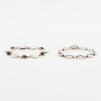 Victor Janson, two silver bracelets, one set with tiger's eye.
