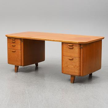A 1950/60's oak writing desk.