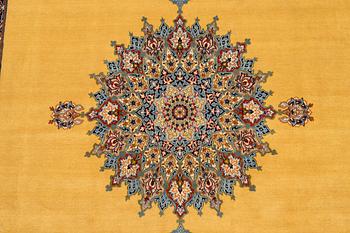 A carpet, Old Esfahan, part silk, ca 311 x 201 cm.