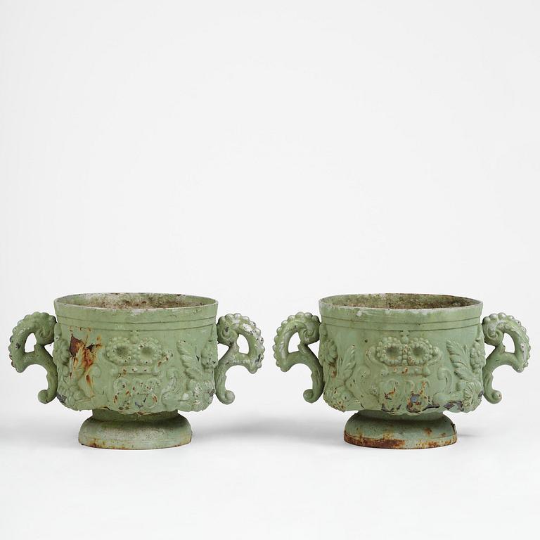 A pair of Swedish cast-iron garden urns, presumably later part 19th century.