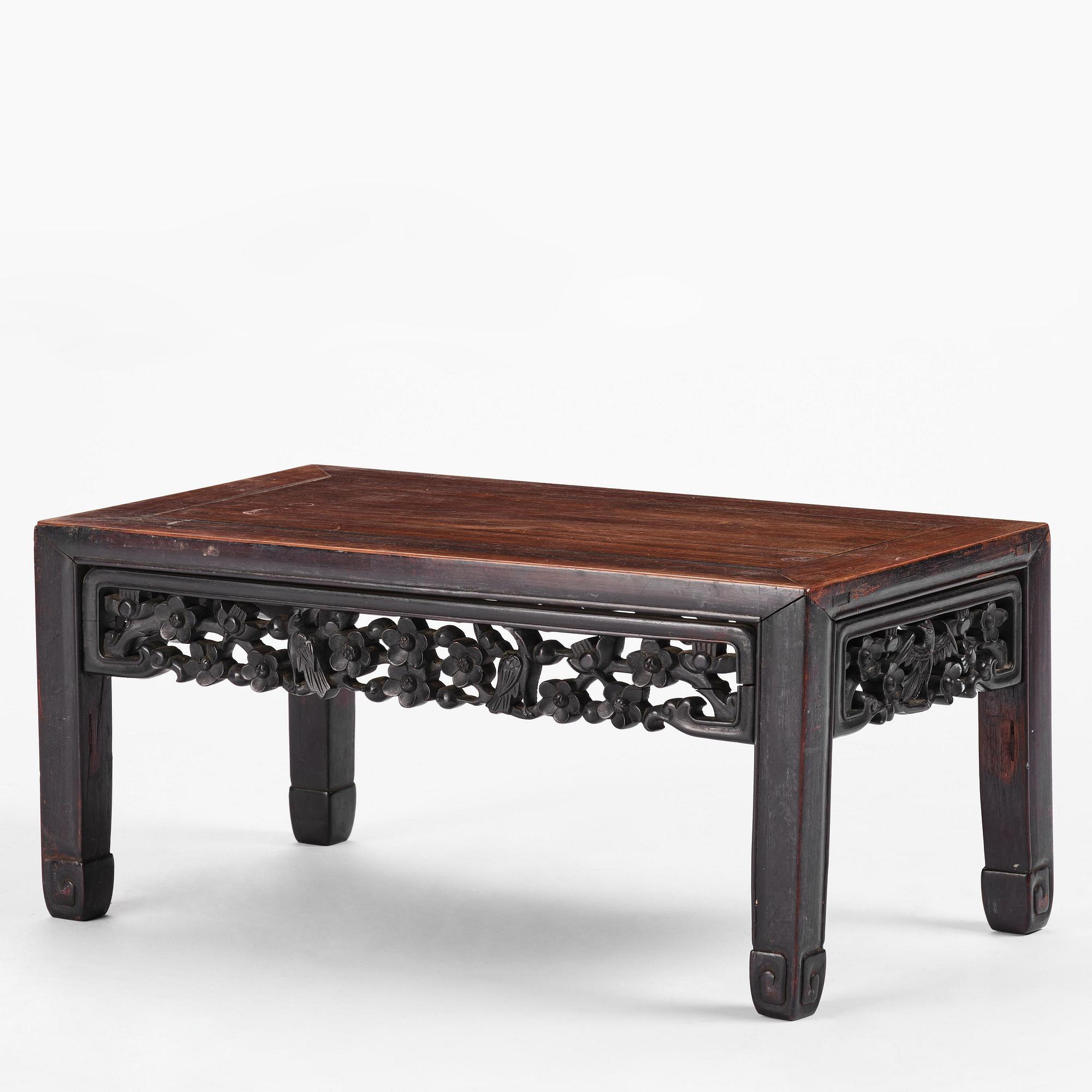 A Chinese hardwood kang table, late Qing dynasty.