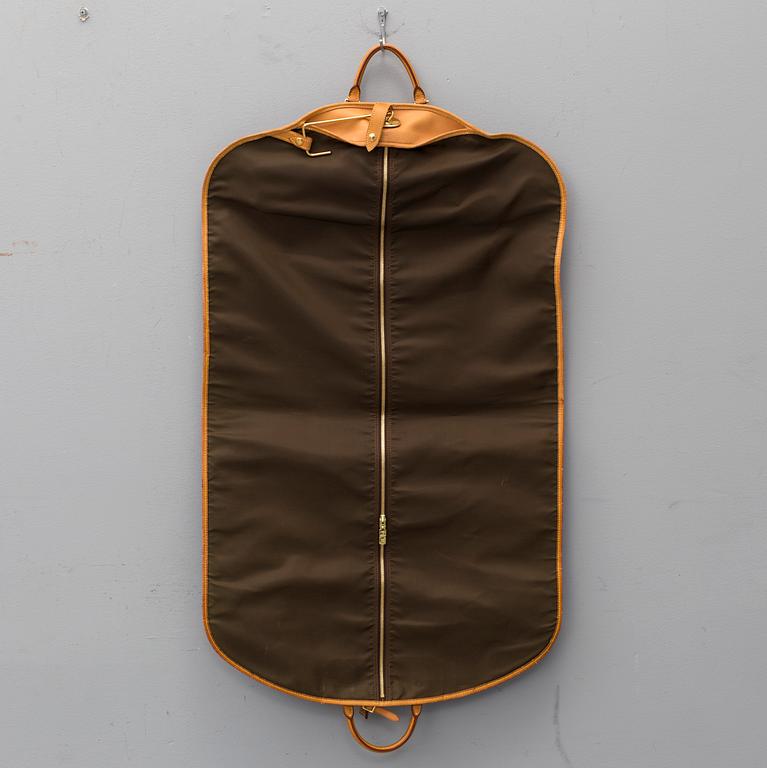 LOUIS VUITTON, a 'Housse Porte-Habits' garment bag.
