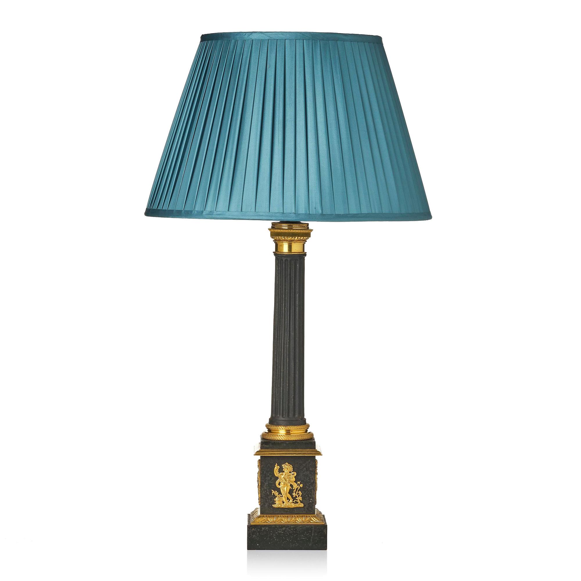 A French Empire ormolu and tole lamp, early 19th century.