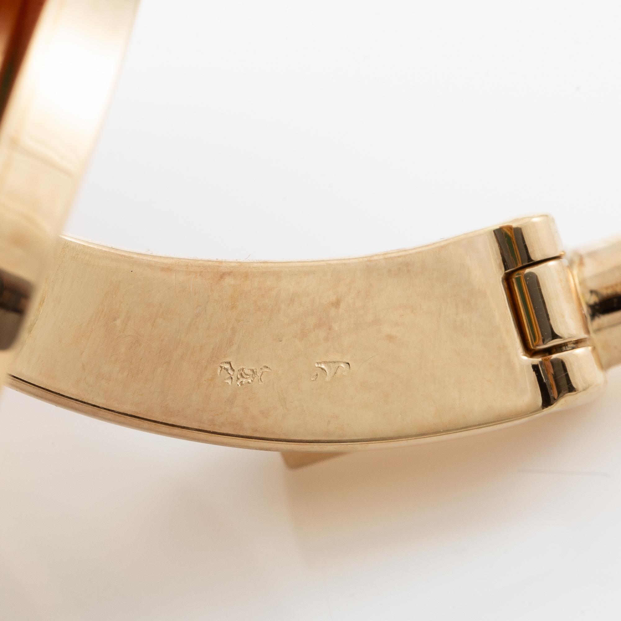 Cufflinks, a pair, 14K gold with cabochon-cut emeralds.