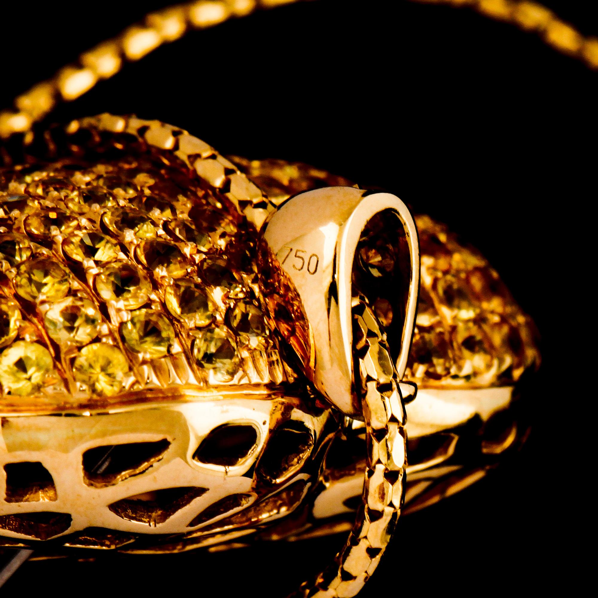 HÄNGE, 18k guld med gula fasettslipade safirer, 4,80 ct. Vikt 11 g.