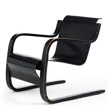 Alvar Aalto, a black lacquered birch cantilevered armchair, "nr 42", O.y Huonekalu-ja Rakennustyötehdas, Finland, 1930's.