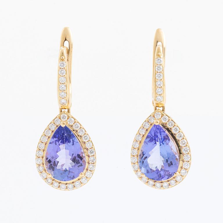 Pear shaped tanzanite and brilliant cut diamond earrings.