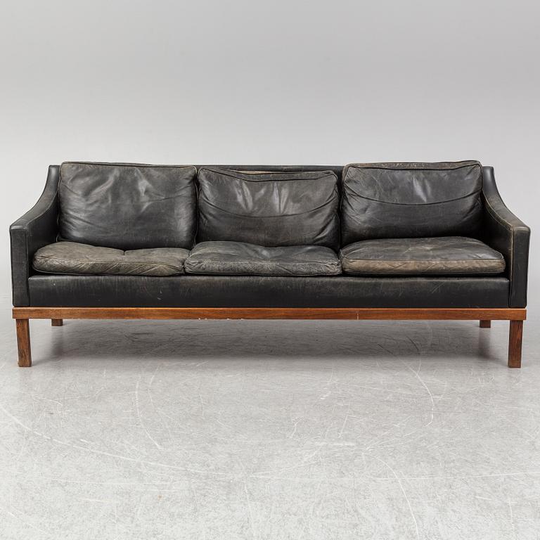 A black leather "The President" sofa by Ingemar Thillmark for OPE-möbler. Sweden.