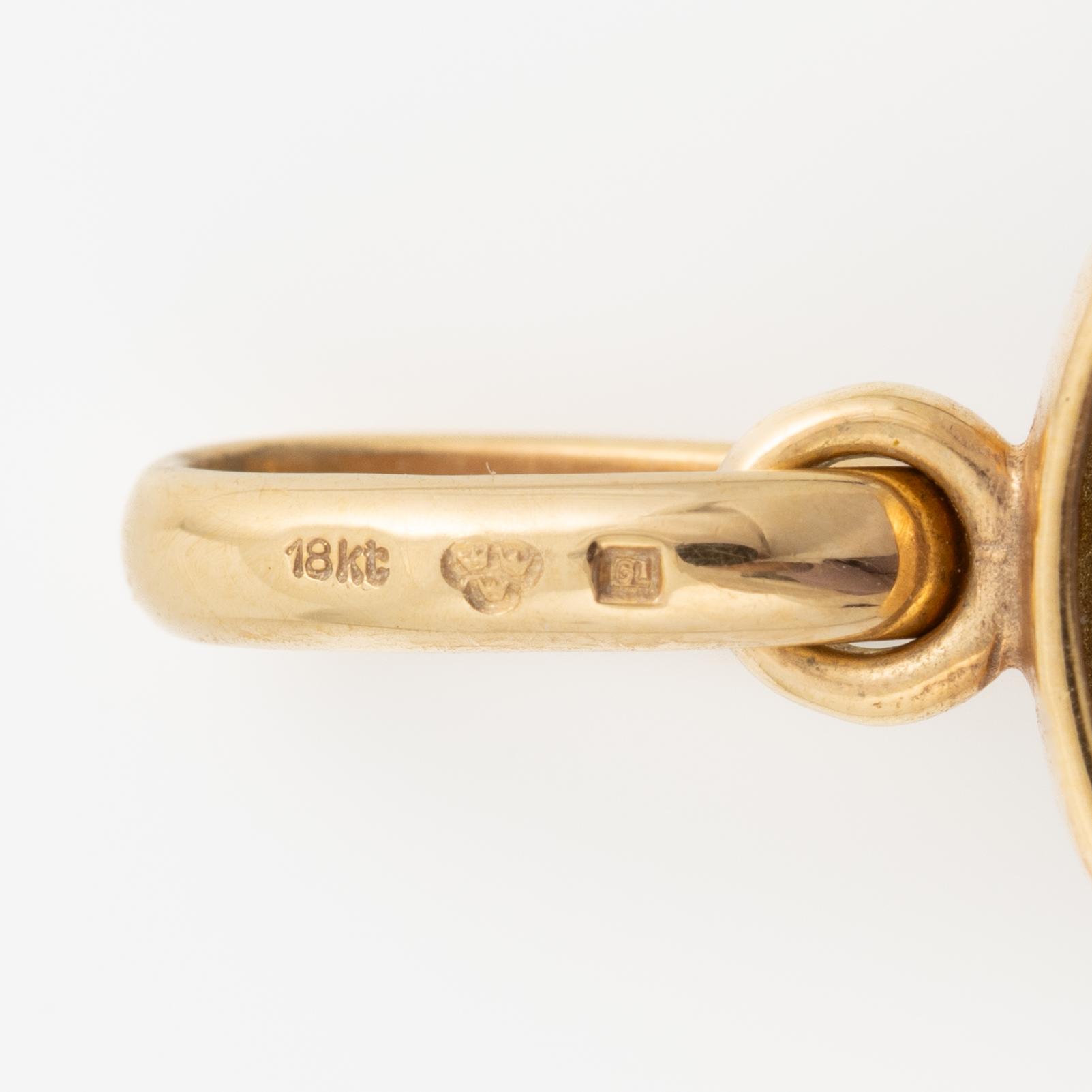 Hänge 18K guld med lapis lazuli sten och en rund briljantslipad diamant.