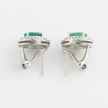 Emerald and brilliant cut diamond earrings.