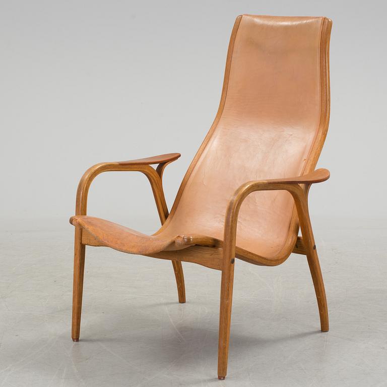 YNGVE EKSTRÖM, a 'Lamino' oak and teak easy chair from Swedese.