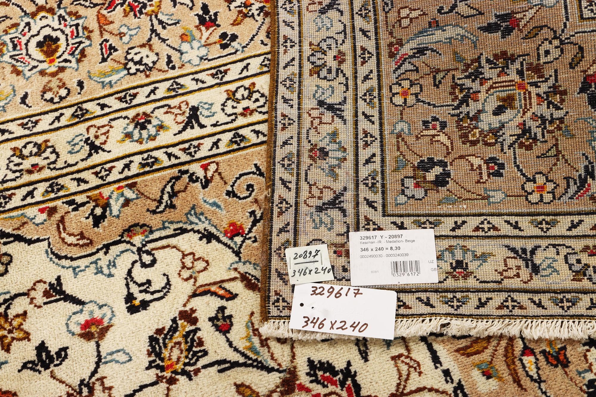 A Keshan carpet, c. 346 x 240 cm.