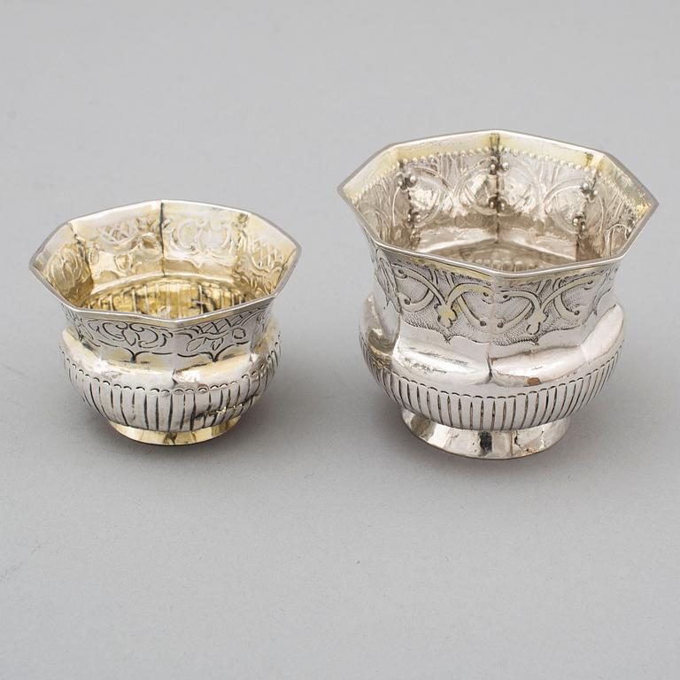 Two Russian 18th century parcel-gilt silver charkas, unidentified makers marks, Moscow.