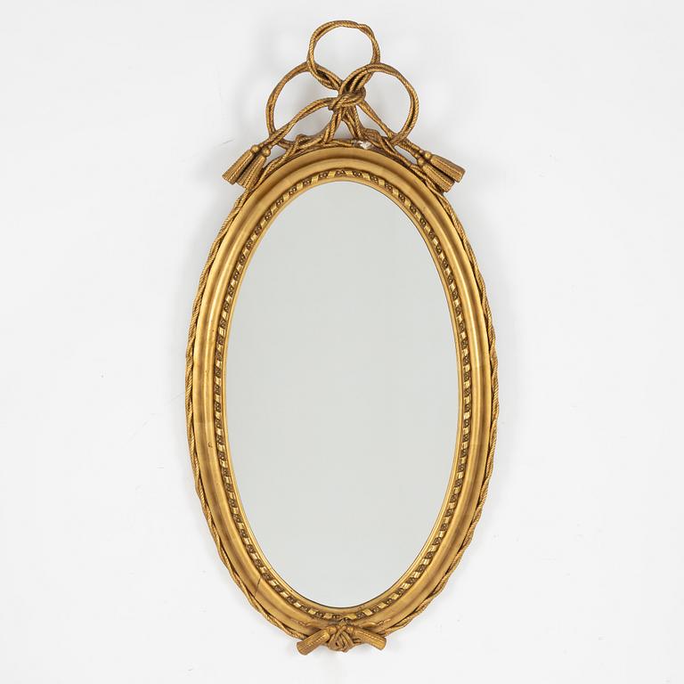 A gilded mirror, early 20th century.