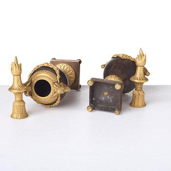 A pair of Louis XVI- style one-light cassolettes, circa 1900.