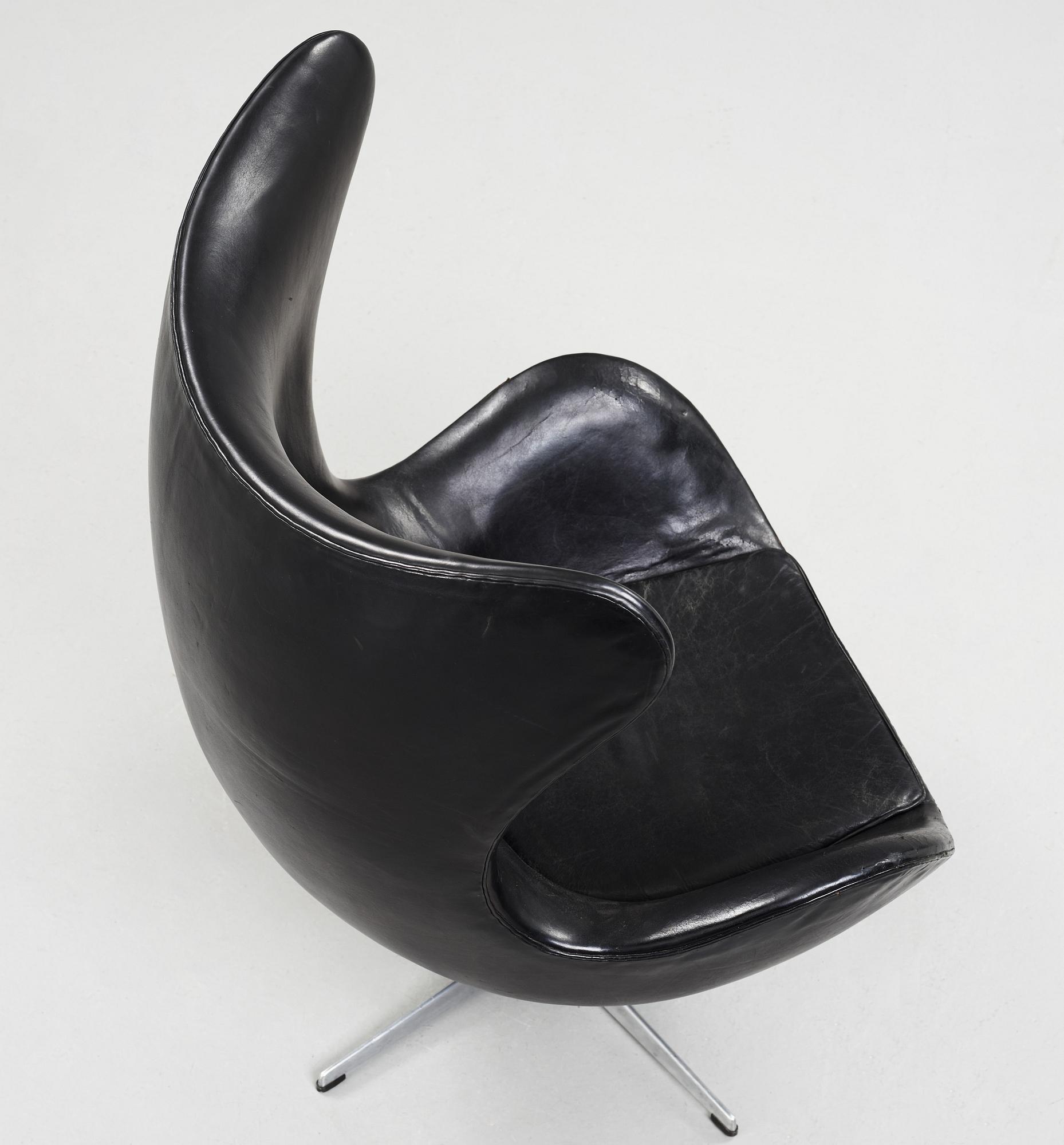 An Arne Jacobsen black leather 'Egg' chair, Fritz Hansen, Denmark 1960's.