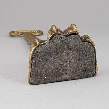 A 19th century bronze door stop.