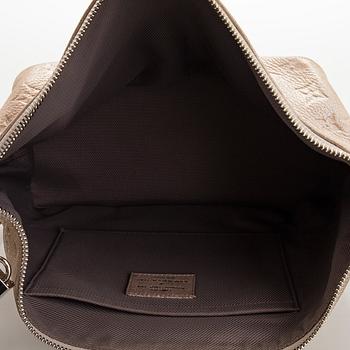 Louis Vuitton, a shimmer 'Halo' bag.