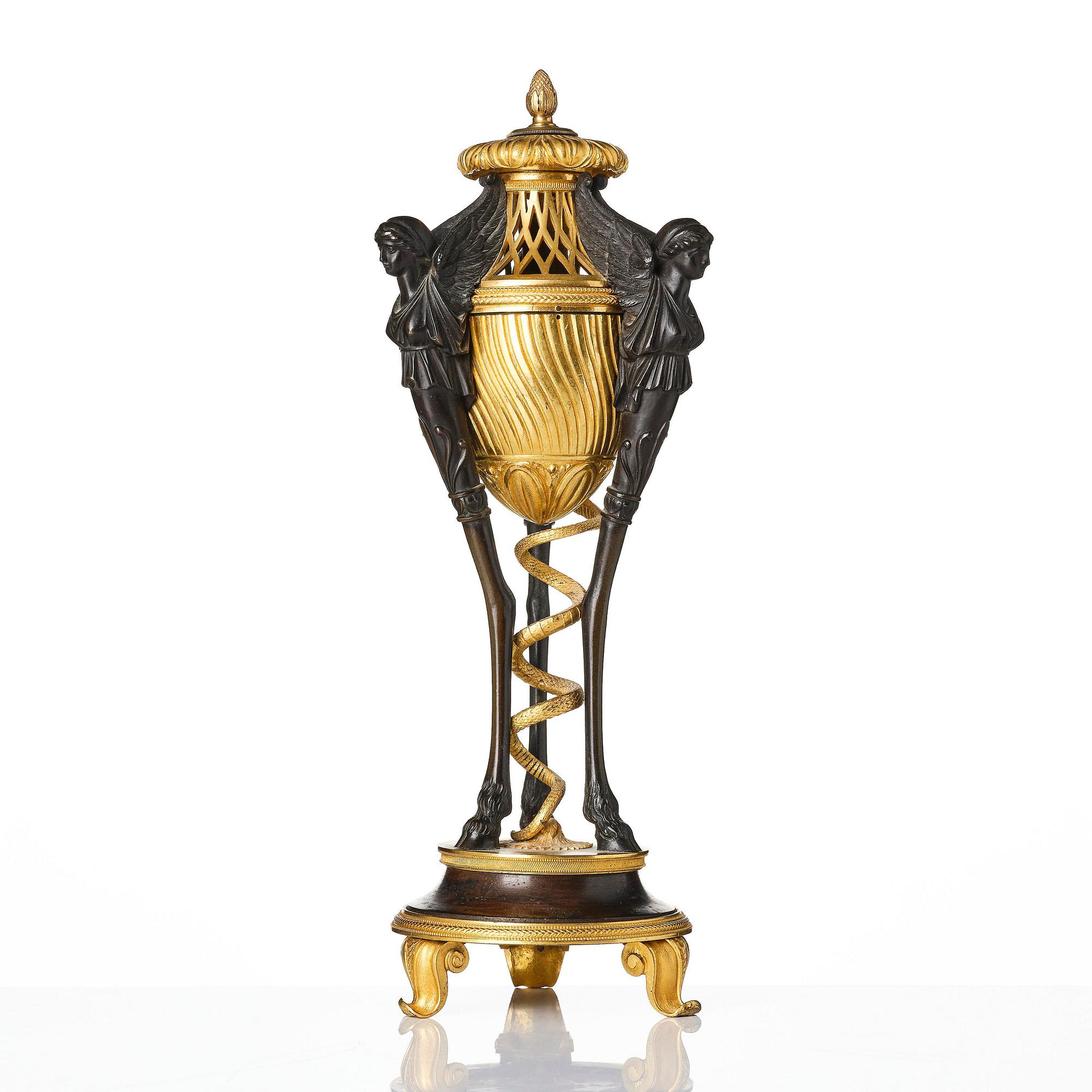 A French gilt and patinated bronze Empire-style brûle-parfum, later part 19th century.