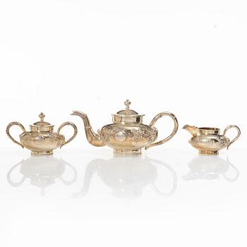 A three-piece Chinese silver tea service, Shanghai, early 20th Century.