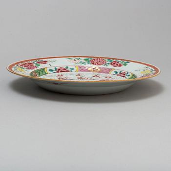 Twelve famille rose export plates, Qing dynasty, 18th century.