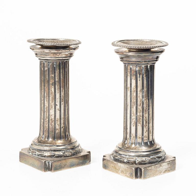 A pair of English silver candlesticks, mark of Arthur Sibley, London 1872.